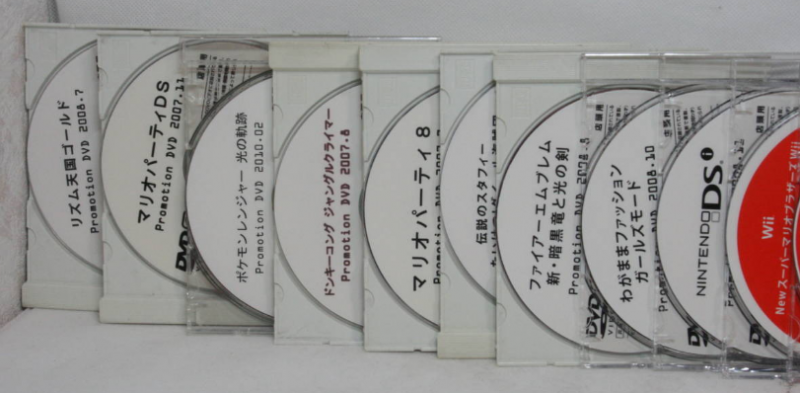 File:Promotional game DVDs.png